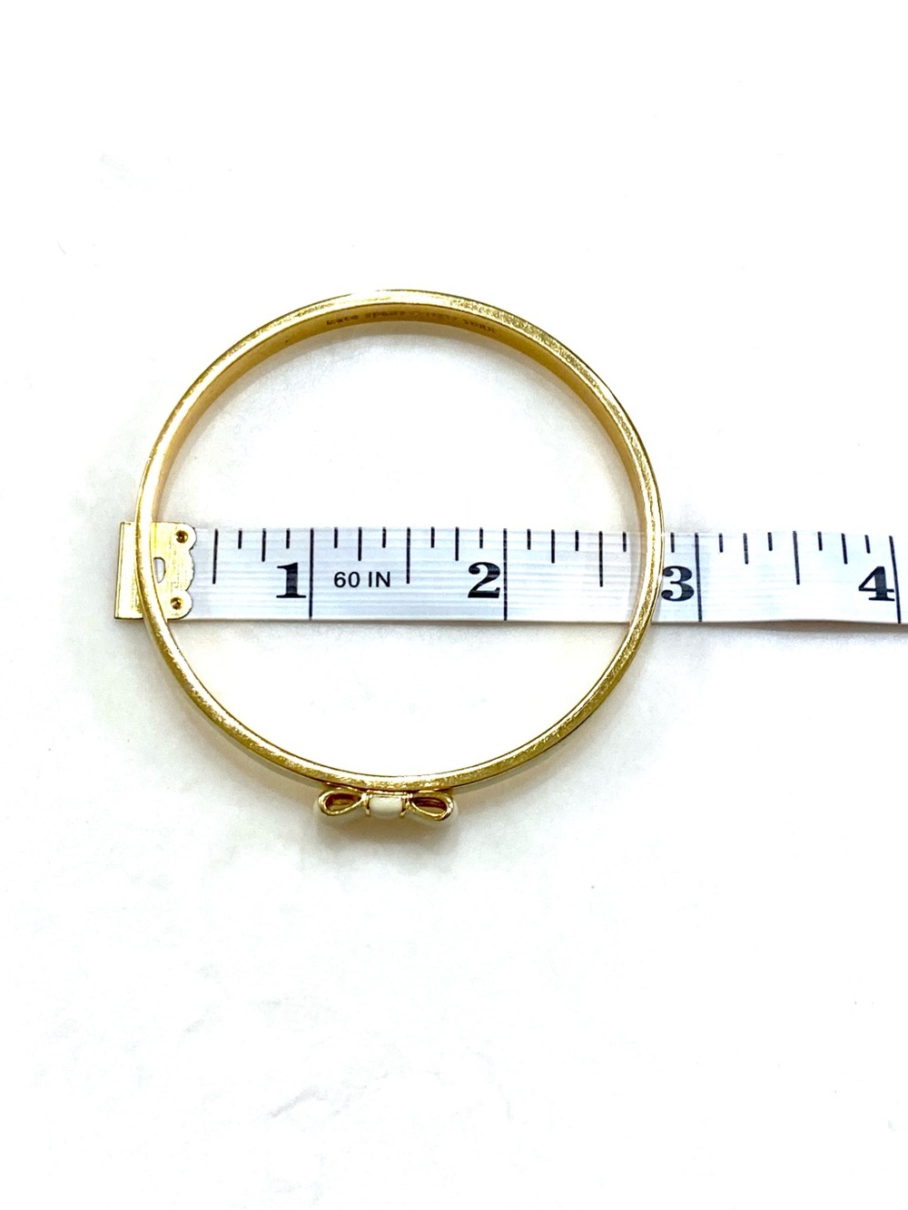 Kate Spade New York Take A Bow Cream Enamel Bangle Bracelet Gold Tone  - Picture 8 of 8